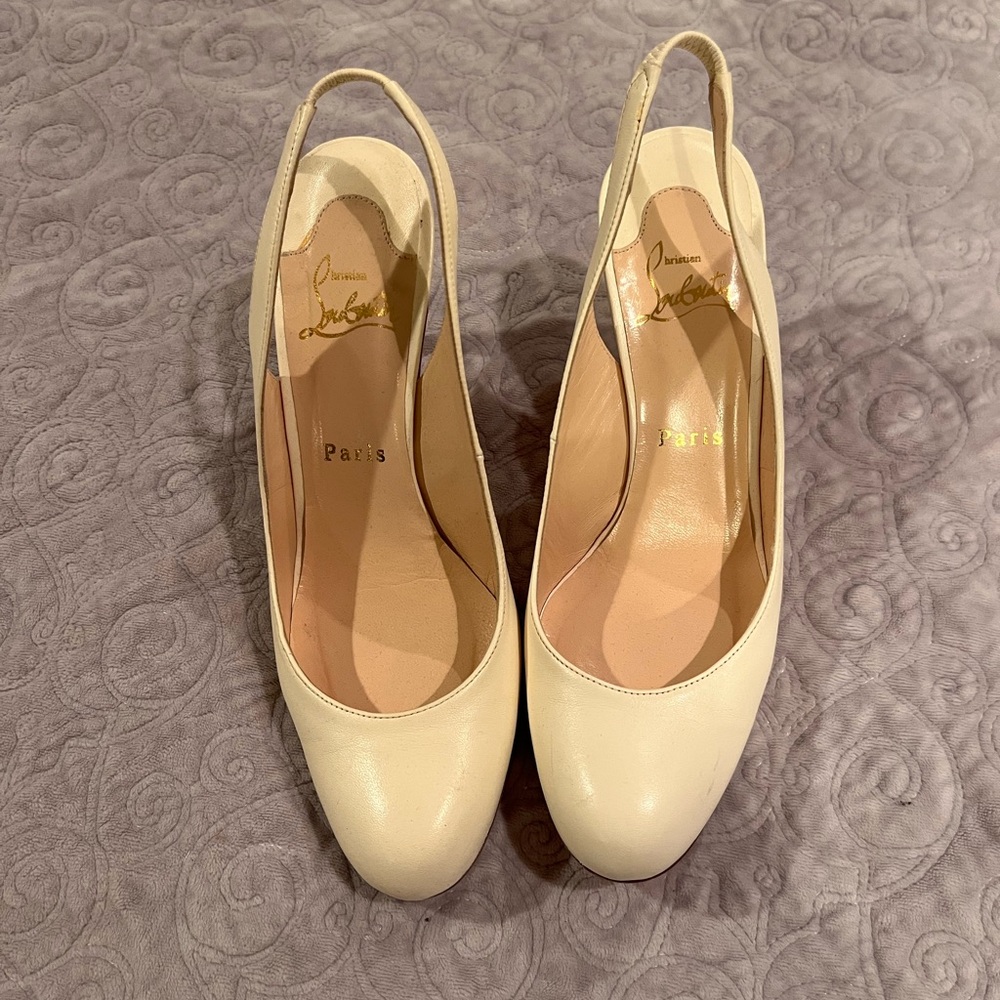 Louboutin  Cream Louboutin Slingback Pumps